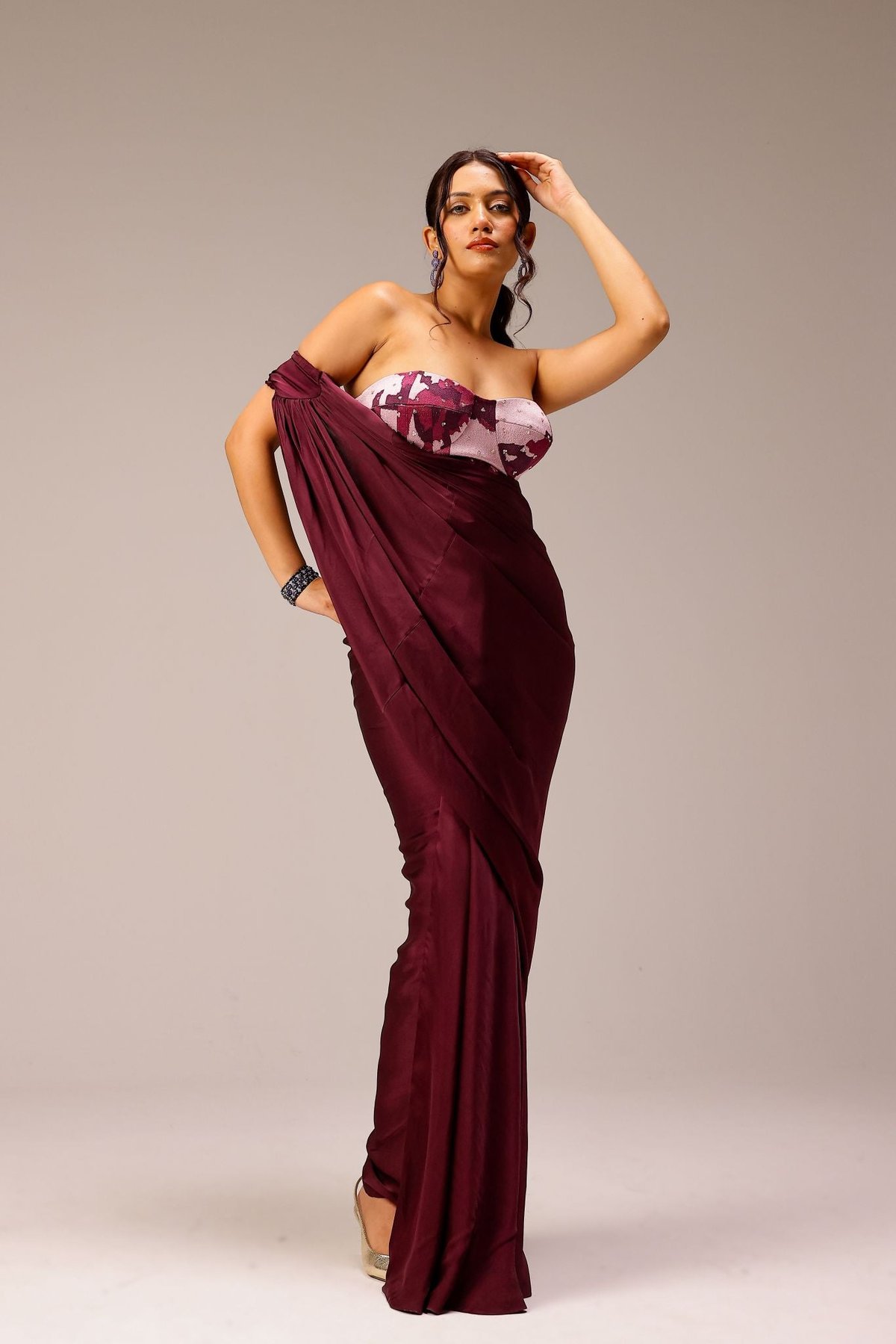 Wine Draped Saree Paired With Hand Embellished Blouse