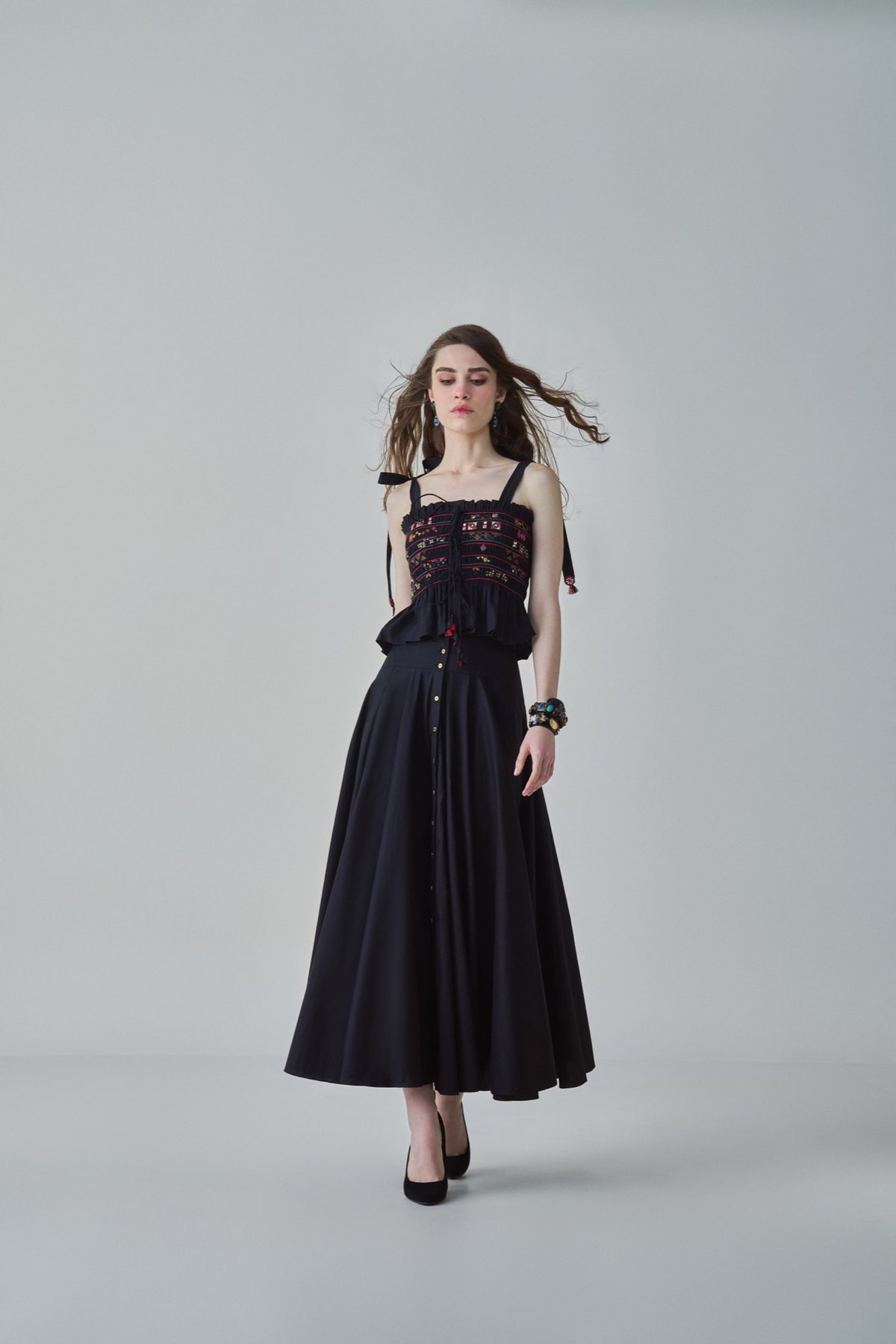 Black Smocked Peplum Blouse With Mirror Work
