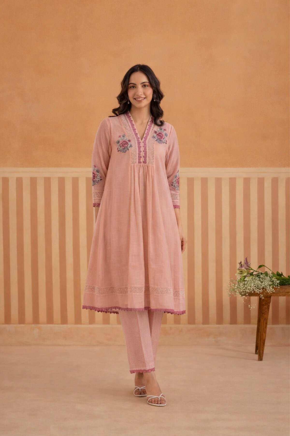 V-Neck Kurta Set with Dark Pink Lace Accents.