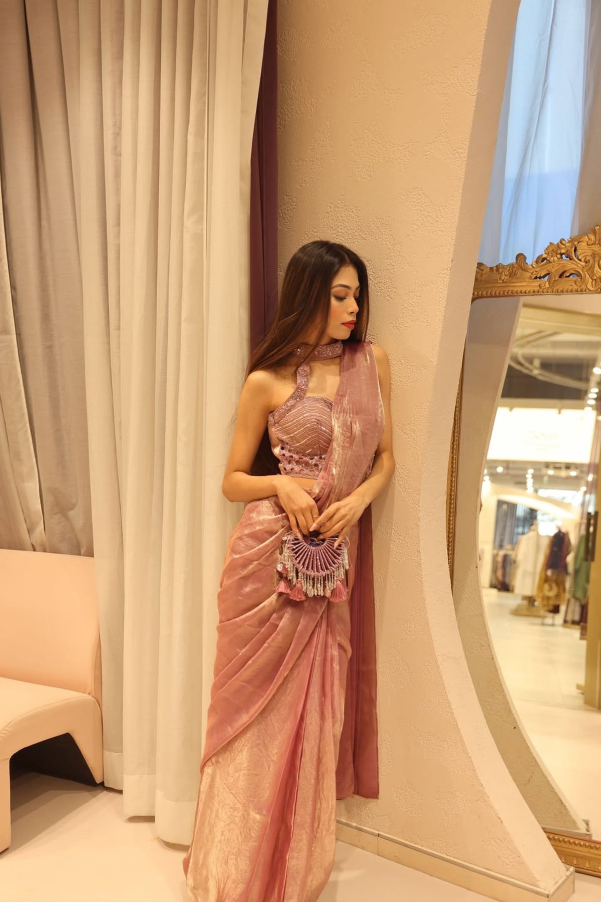 Pink Shimmer Tissue Saree with Embellished Halter Blouse
