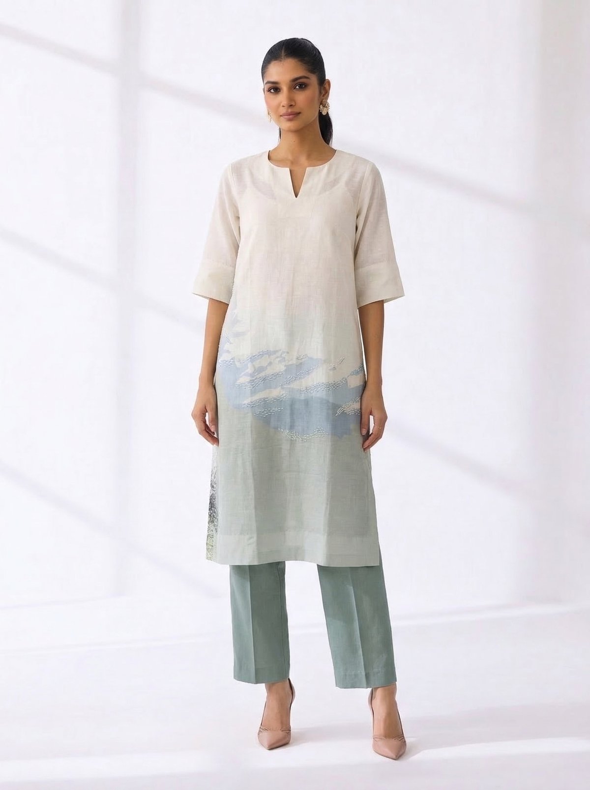 Off White Shirt Paired With Pants And Inner