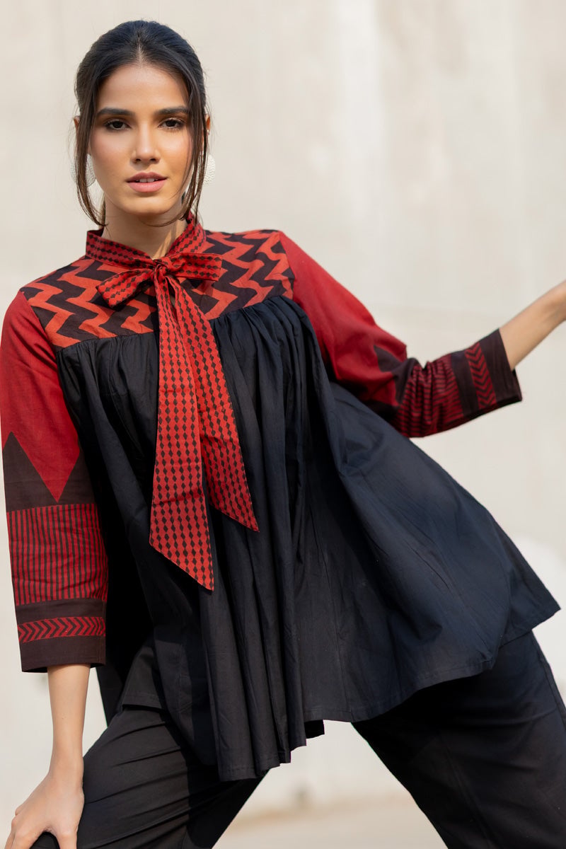 Black Flowy Tie-Neck Top with Red Printed Yoke