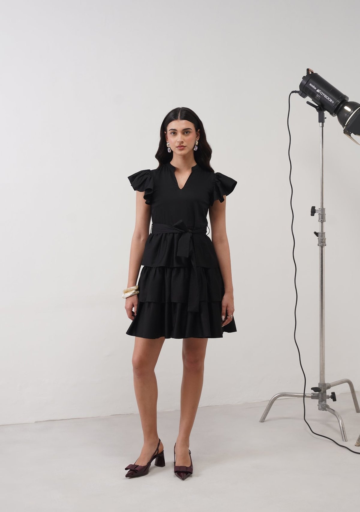 Black Tiered Mini Dress with Ruffle Sleeves and Belt