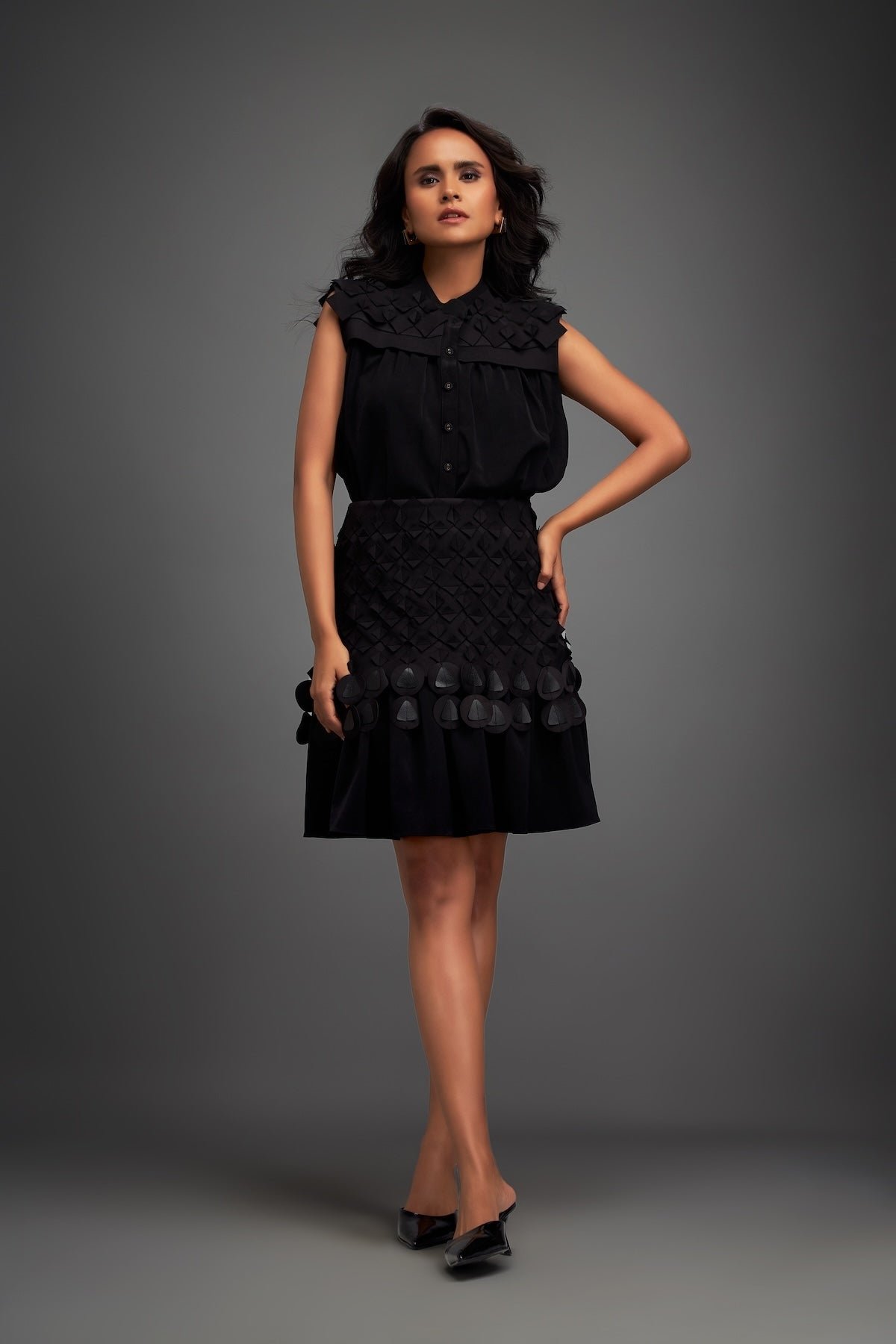 Black Sleeveless Buttoned Top & Applique Skirt