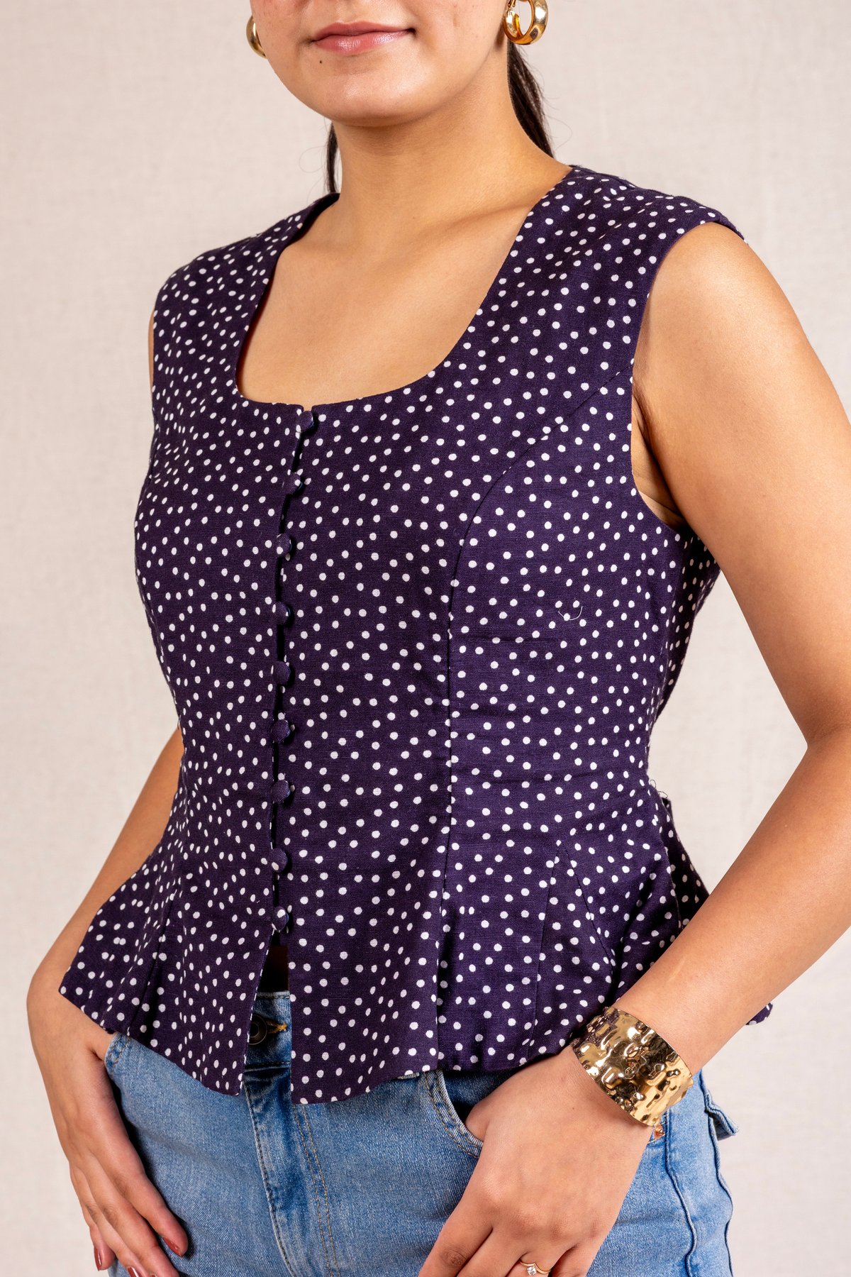 Navy Polka Dot Peplum Sleeveless Top