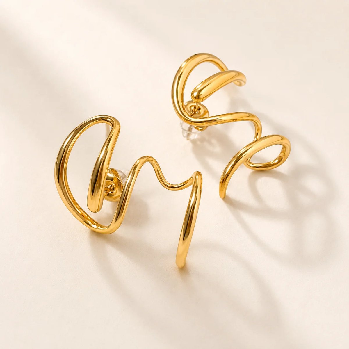 Twist Muse Earrings