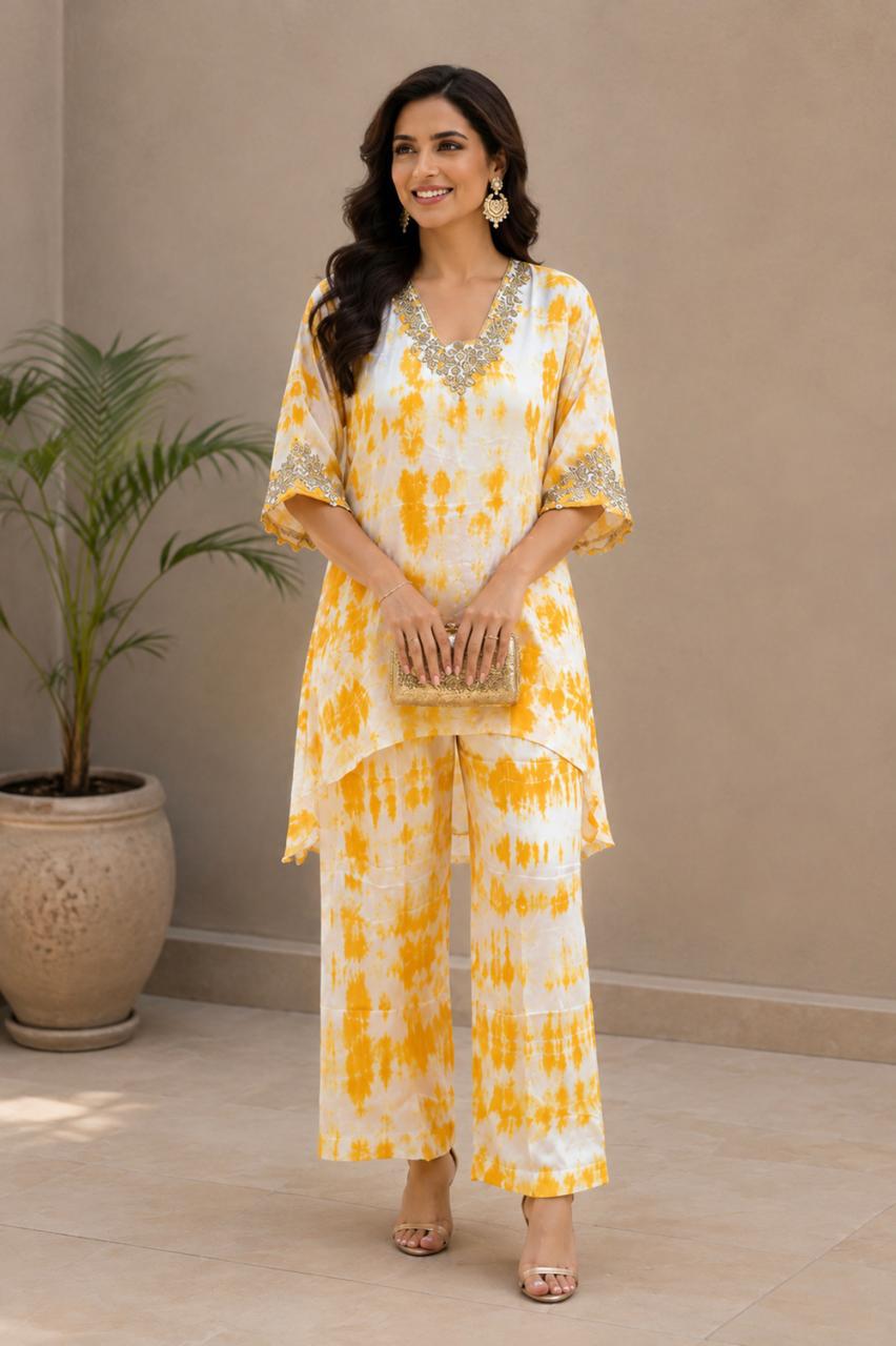 Tie & Dye Yellow colour with Tilla work on pure modal satin accessorize with brass coins with palazzo pants