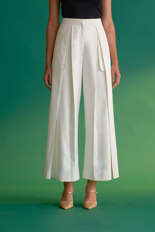 Ivory High-Rise Wide-Leg Pleated Trousers — NOTEBOOK