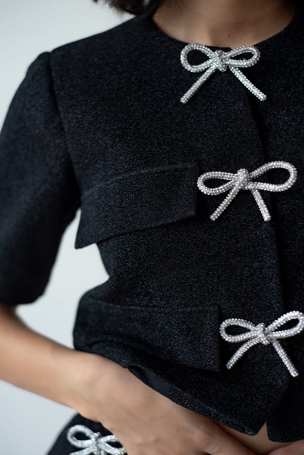 Black Cropped Glitter Jacket with Rhinestone Bow Details — MAGIA