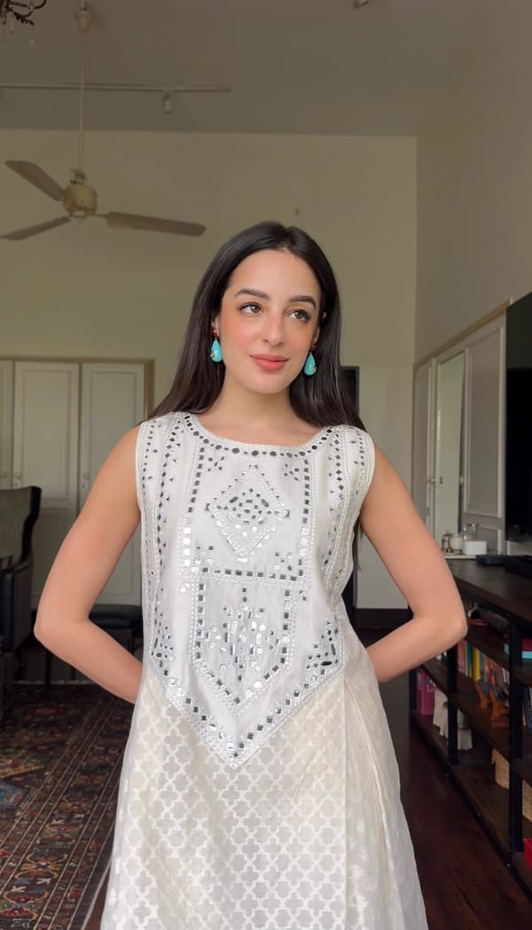 Off White Sleeveless A-Line Kurta with Mirrorwork Yoke — Gulabo by Abu Sandeep