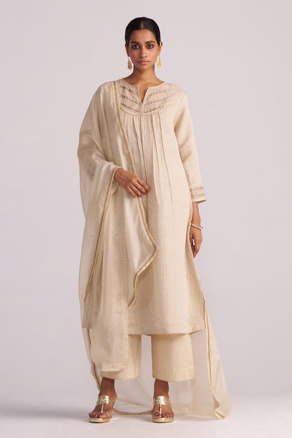Beige A-Line Textured Kurta Set with Embroidered Yoke — Ganga Fashions Pvt Ltd