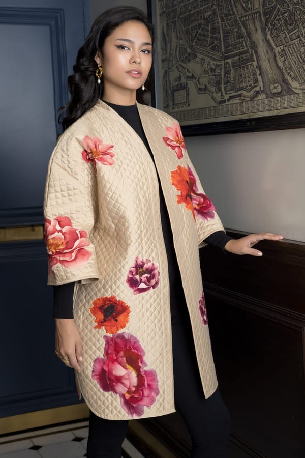 Beige Quilted Cape Coat with Floral Applique — Rhe-Ana