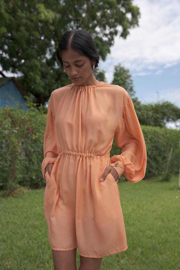 Peach Mini Smock Dress with Tie-Up Neck and Pockets — ALTER NATIVE
