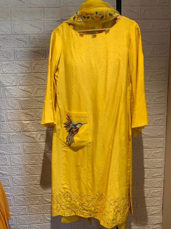 Yellow A-Line Kurta Set with Boat Neck and Embroidered Pocket — SHRISTICHETANI