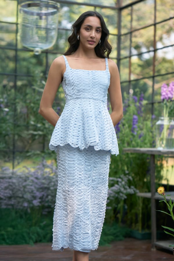 Ice Blue Ribbon Appliqué Peplum Top — Dash and Dot