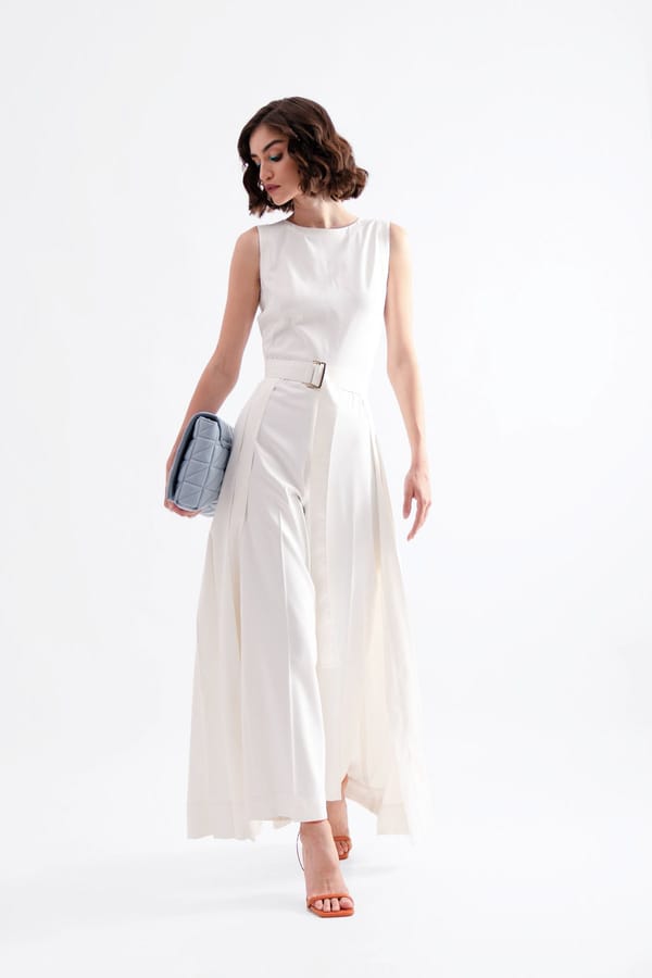 White Sleeveless Jumpsuit with Detachable Pleated Panel — NOTEBOOK