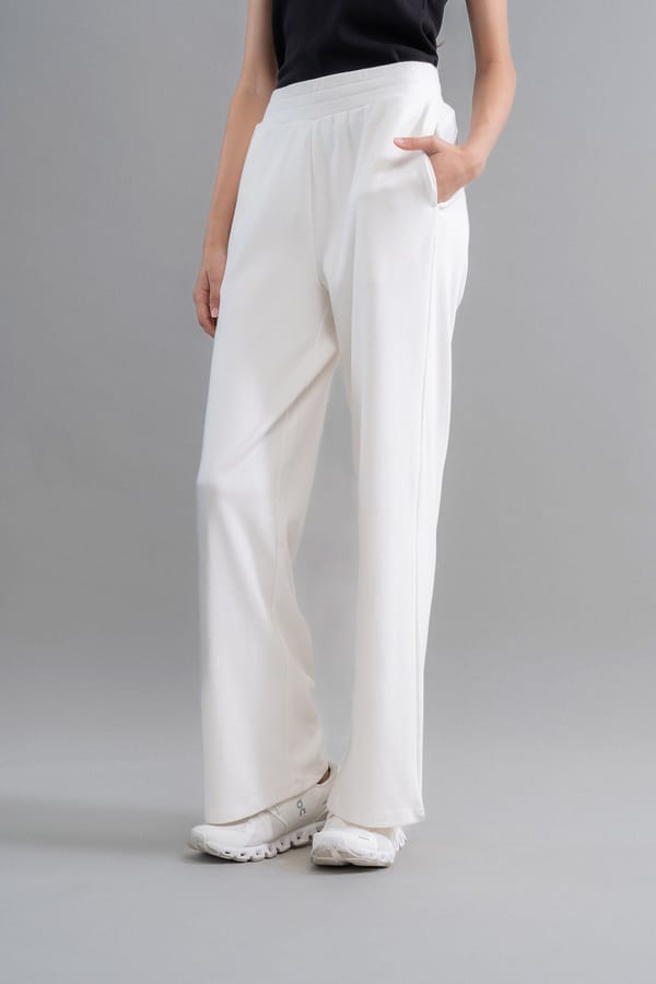 Ivory High-Rise Flared Knit Trousers with Pockets — Necesera