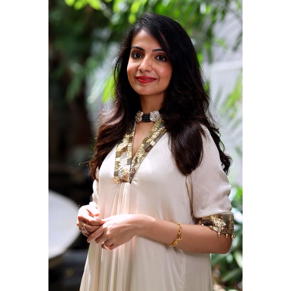 Beige Satin A-Line Kurta Set with Gold Embellished Neck — Isha Sawhney