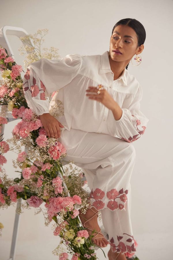 Off-White Straight-Fit Trousers with Embroidered Hem — WESTERNERA