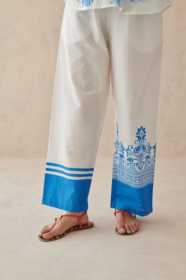 White Straight-Leg Cotton Pants with Blue Border Print — ROHO