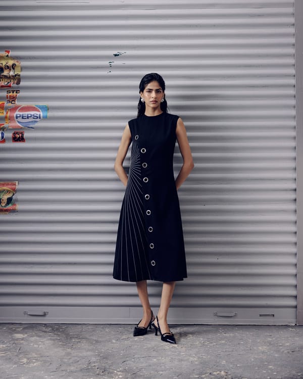 Black Asymmetrical Pinstripe Midi Dress with Metal Eyelets — Veera Wear