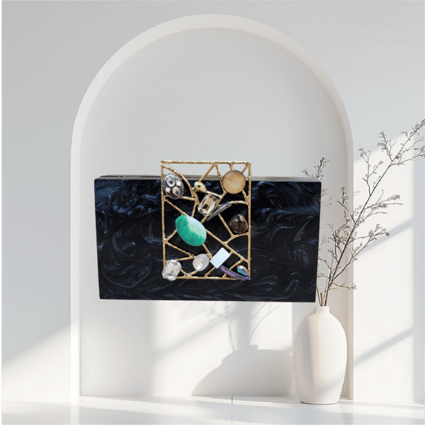 The Auor Clutch — Adwita
