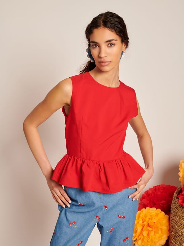 Red Sleeveless Peplum Top with Open Back Bow Detail — SISTER JANE