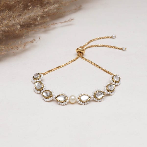 Golden Tilak Kundan With White Pearls Adjustable Bracelet — BeAbhika