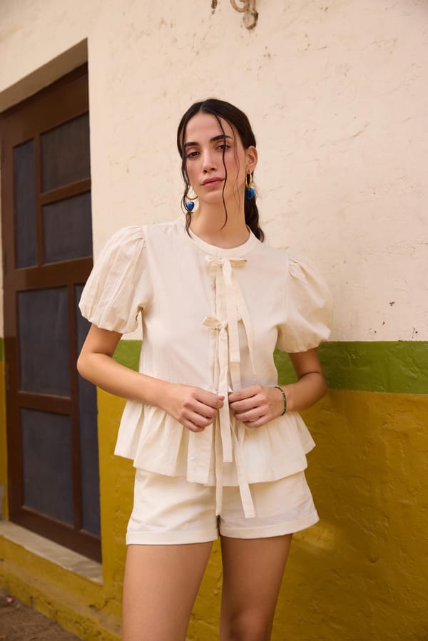 Off White Beige Front Tie-Up Peplum Top — The clothing factory