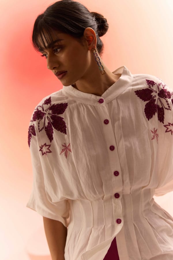 Off White Drop Shoulder Embroidered Peplum Top — WESTERNERA