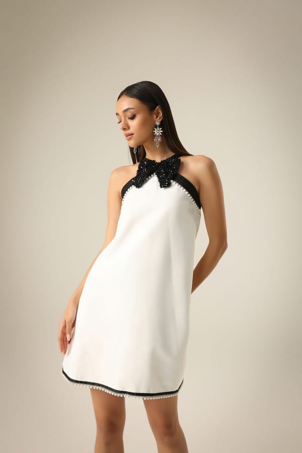 Ivory Halter Neck A-Line Mini Dress with Bow and Pearl Trim — Label IRIS