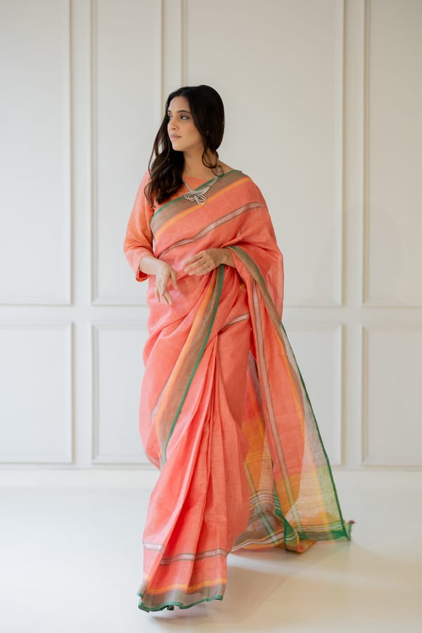Peach Linen Saree with Striped Border and Tassels — Silai studio