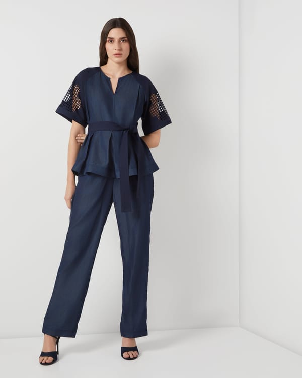 Navy Tencel Denim Peplum Top with Cutwork Sleeves — Needle Ten