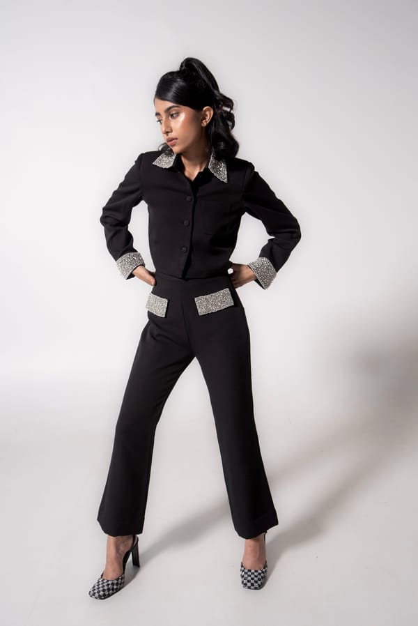 Black Cropped Flared Trousers with Embellished Flaps — MAGIA