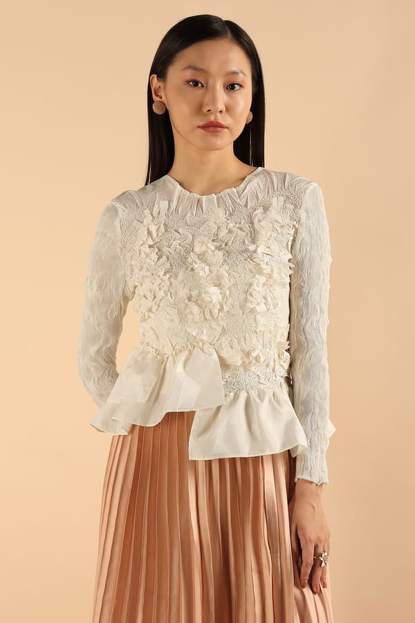 Ivory 3D Floral Appliqué Peplum Top with Full Sleeves — Pleats by Aruni