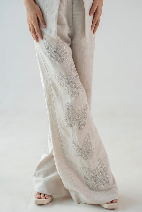 Natural Linen High-Waist Flared Trousers with Butterfly Work — MAGIA