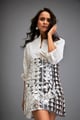Shirt Paired with a Metallic Mini Skirt Silver & White color