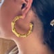Glory of the East Chunky Hoop Earrings Gold color