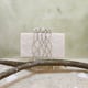 Three Stone Criss Cross Clutch Ivory/White color