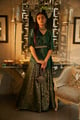 Nora Asymmetrical Top with Brocade Ghagra & Belt Green color
