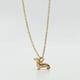 Tiny Dog Charm Gold color