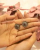 Adya Intricate Versatile Flower Studs Silver color