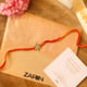 Traditional Touch Floral Rakhi Gold color