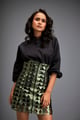 Shirt Paired with a Metallic Mini Skirt Green & Black color