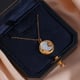 Dainty Shell Sun & Moon Necklace, Paulami Gold color