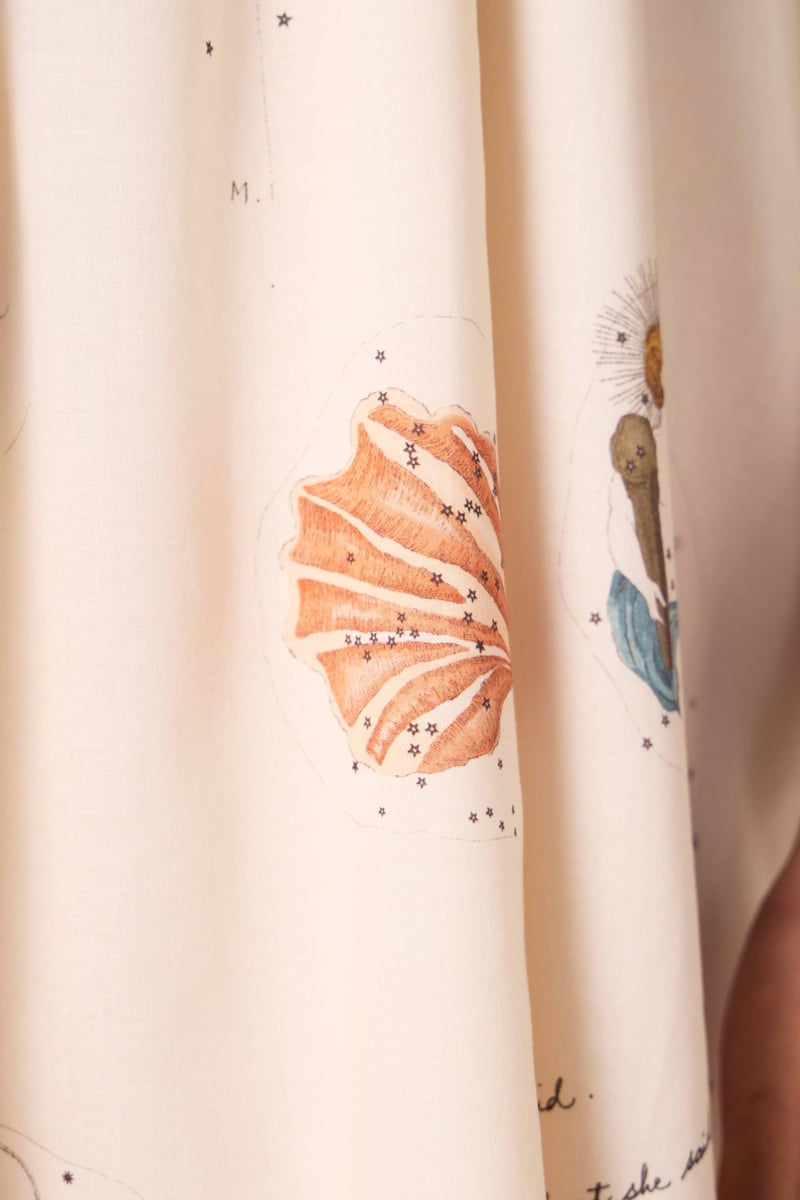Beige Zodiac Print Halter Mini Dress with Bow-Tie Back