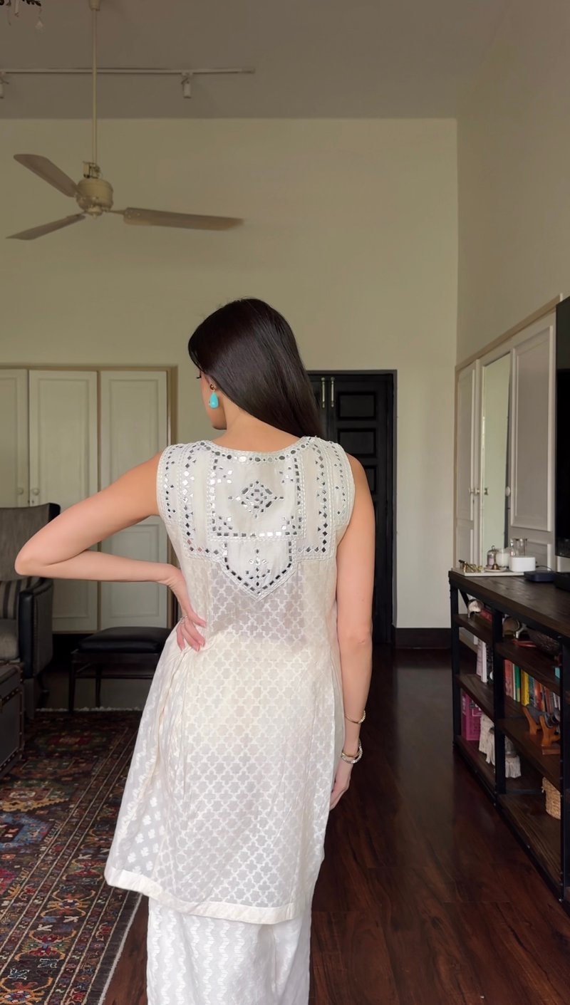 Off White Sleeveless A-Line Kurta with Mirrorwork Yoke