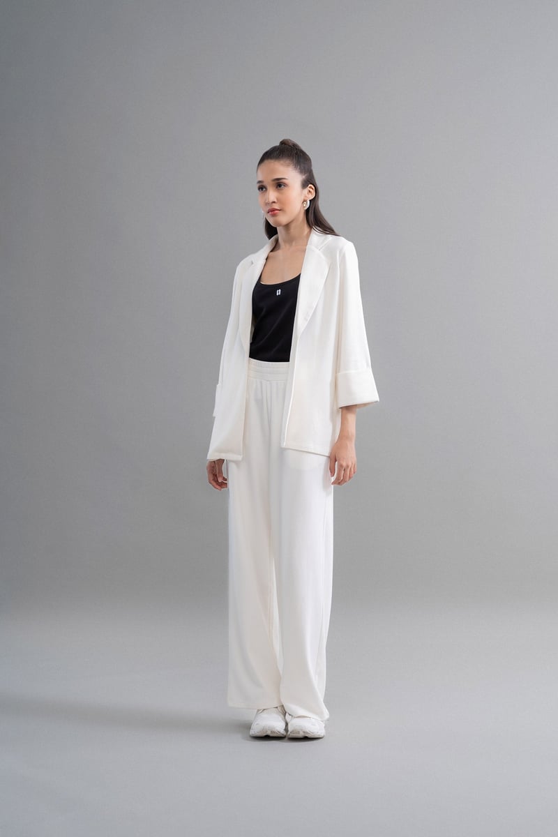 Ivory High-Rise Flared Knit Trousers with Pockets