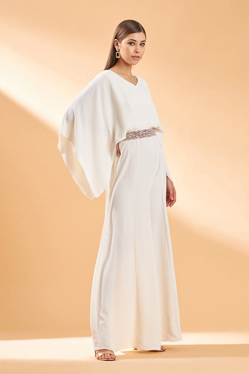 Cream Draped Cape Sleeve Jumpsuit with Embellished Belt
