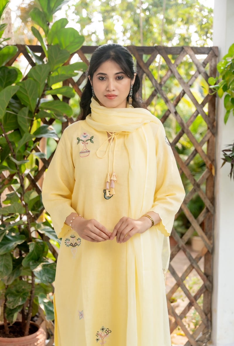 Pastel Yellow Linen Kurta Set with Embroidered Motifs